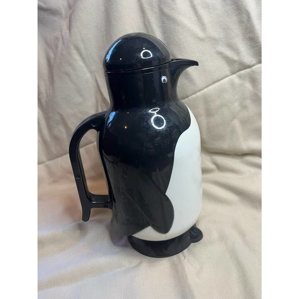 Penguin metrokane pitcher